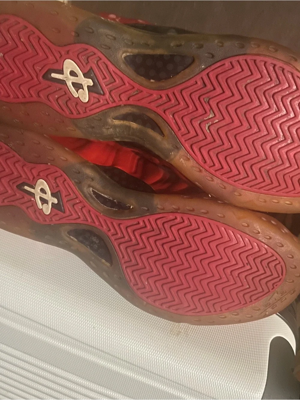 Nike men’s Red and Black Foamposite Sneakers